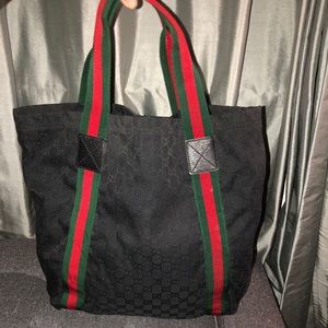 Authentic Gucci canvas tote with signature details